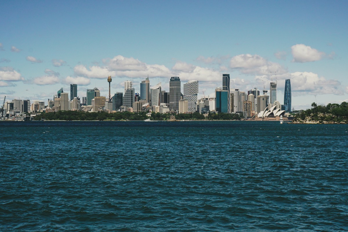 Sydney Opera House and city skyline across the harbour